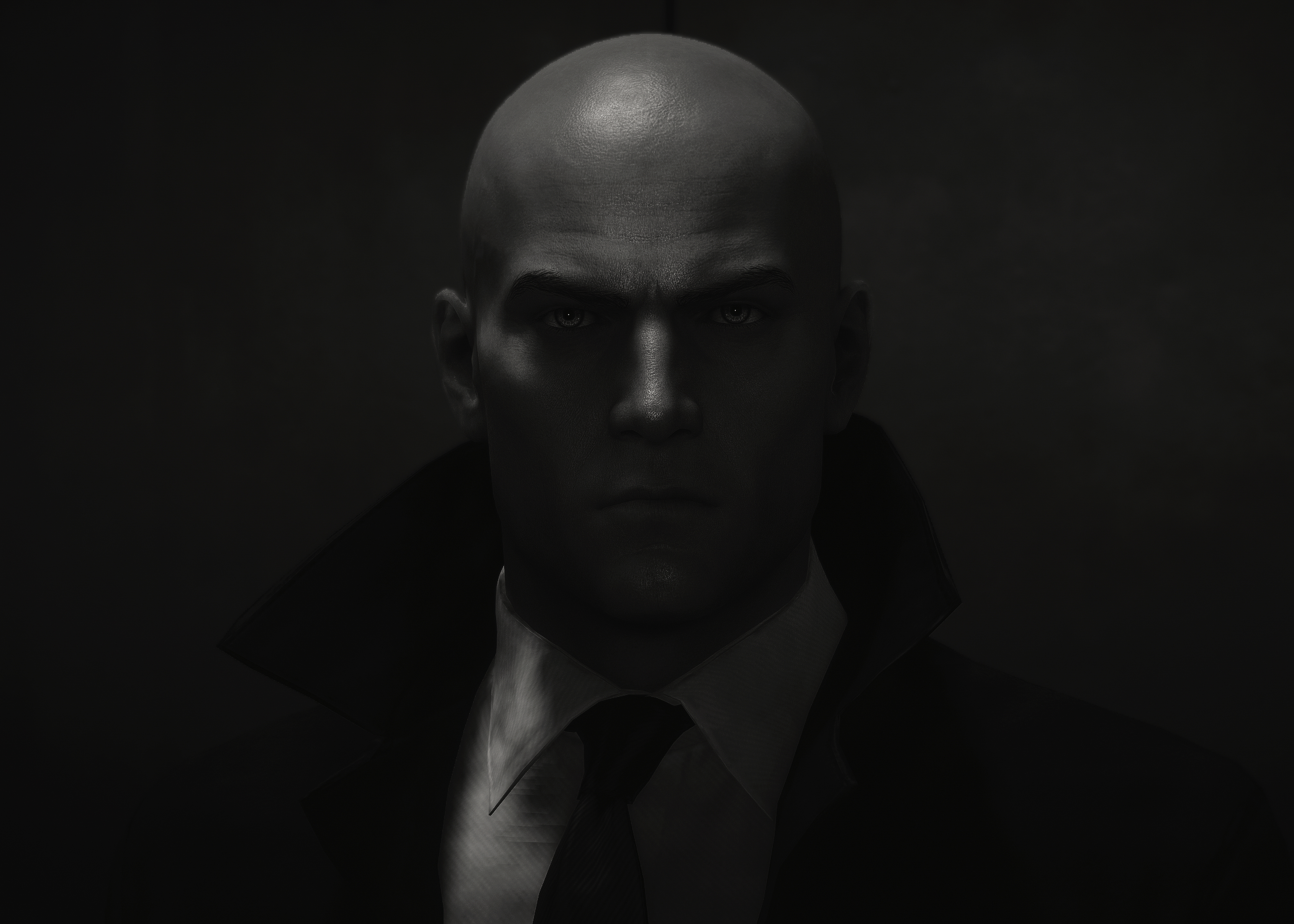 A tight character portrait using F3 camera lock — the camera stays fixed while 47 is posed, then the game is frozen for a clean capture. Shot by CoalaTV.